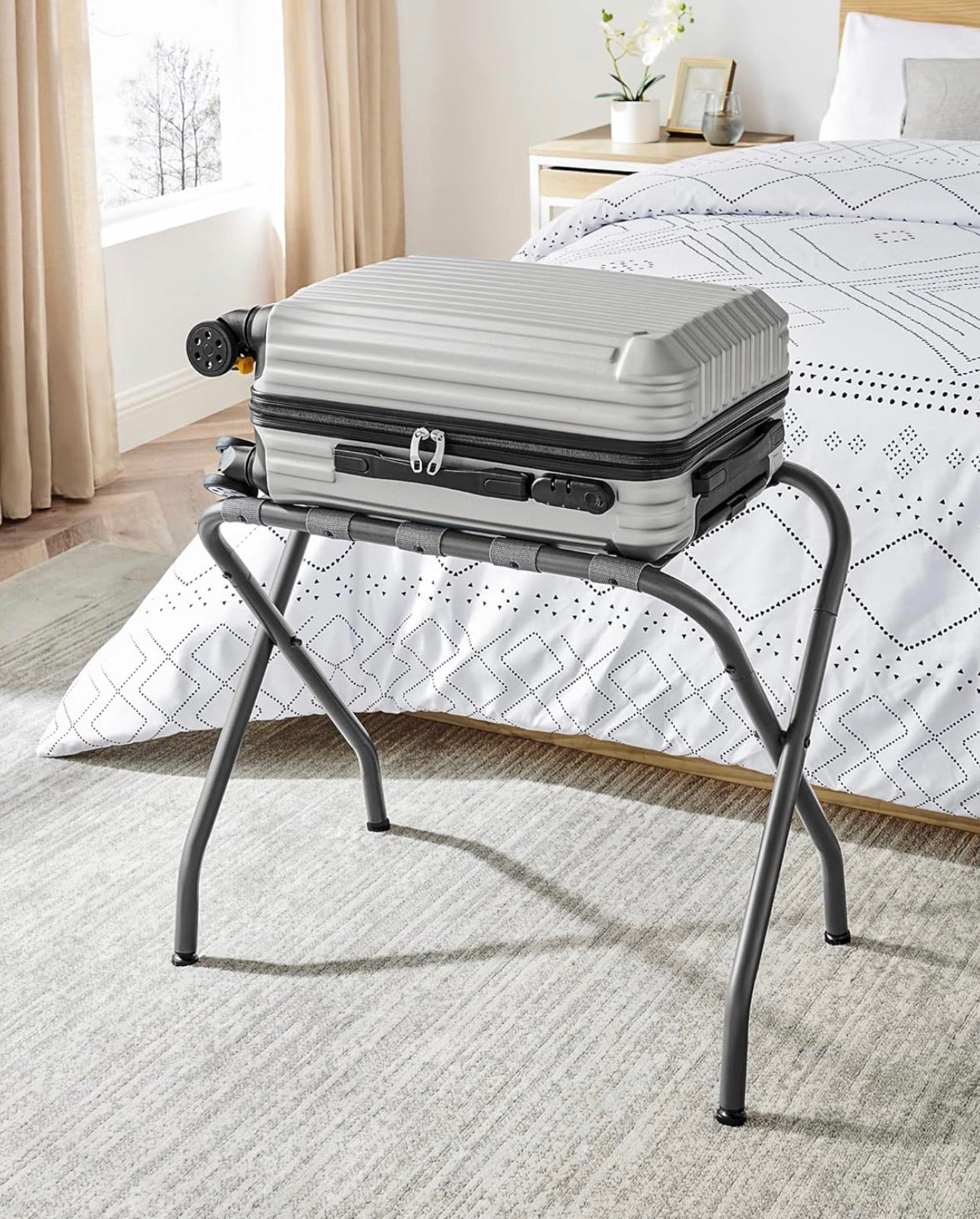 SONGMICS Foldable Steel Luggage Rack